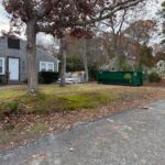 dumpster on driveway cape cod