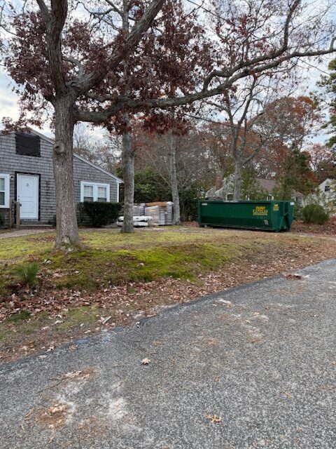 dumpster on driveway cape cod